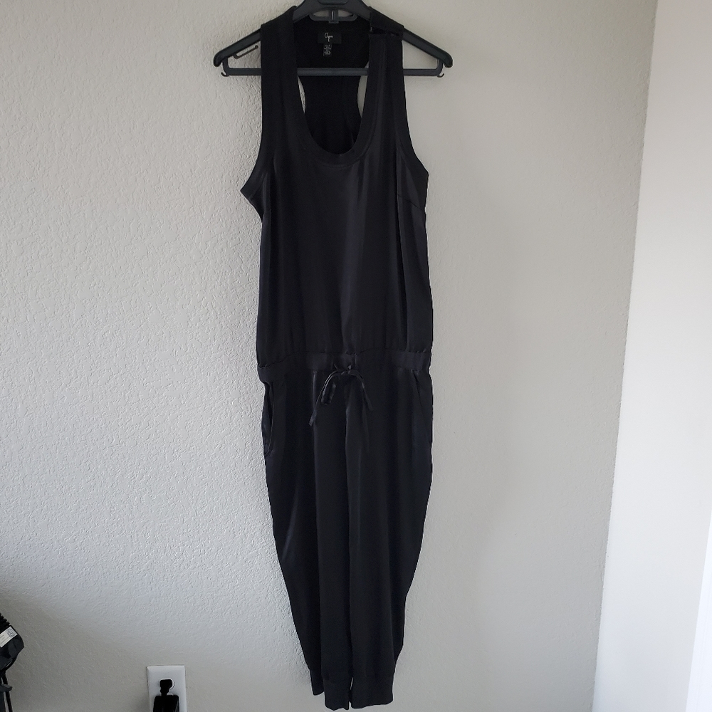 Aqua satin like material black racer back jumpsuit